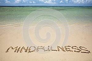 Mindfulness Written Text On Sand At Beach