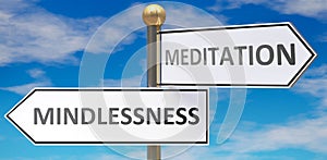 Mindlessness and meditation as different choices in life - pictured as words Mindlessness, meditation on road signs pointing at photo