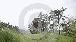 Mine clearance. Military service. Soldier using mine detector, neutralizing mines, disarms a mine, soldier removes mines