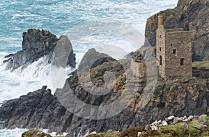 Mine engine house at the foot of cliffs, Botallack, Cornwall.