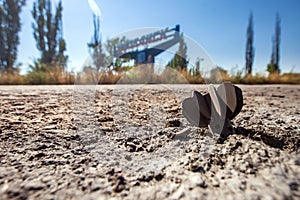 Mine shell stuck in the road, War actions aftermath, Ukraine and Donbass conflict photo