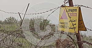 Minefield warning sign in the Golan Heights in the Syria Israel border