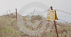 Minefield warning sign in the Golan Heights in the Syria Israel border