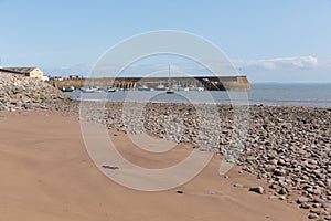 Minehead beach and harbour Somerset England uk in summer with blue sky on a beautiful day photo