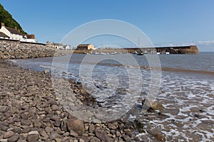 Minehead Somerset England uk beach pebbles and rocks and sea