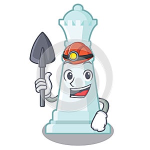Miner chess queen in the cartoon shape photo
