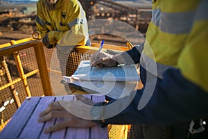 Miner supervisor sigh of working at height permit prior to performing high risk work photo