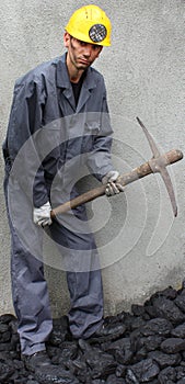 Miner using a pickaxe