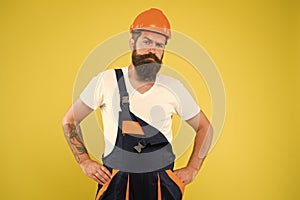Miner wear helmet for safety. expert in building. brutal male worker with beard. he is just artisan. choose your