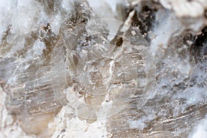 Mineral inside of stone. Unpolished quartz excavating or deposit. Semi-precious gems