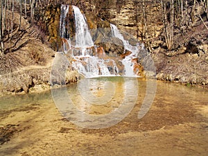 Mineral-rich waterfall in Lucky village