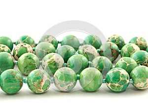 Mineral rock green Variscite gem stone isolated on white background photo