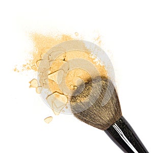 Mineral shimmer powder golden color with makeup brush