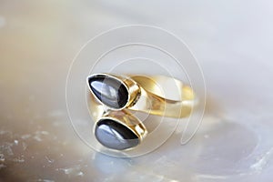 Mineral stone ring on natural background