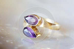 Mineral stone ring on natural background