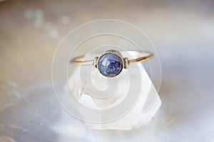 Mineral stone ring on natural background