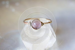 Mineral stone ring on natural background