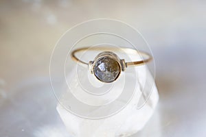 Mineral stone ring on natural background