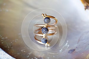 Mineral stone ring on natural background