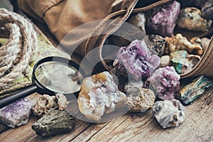 Mineral stones collection and kit of geologist - backpack, map, magnifying glass, rope.