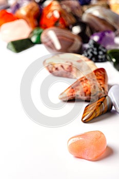 Mineral stones on a white background. The concept of using minerals and crystals in astrology and alternative or