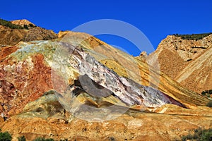 Mineral streaks and sediments in a old abandoned quarry