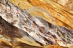 Mineral streaks and sediments in a old abandoned quarry photo