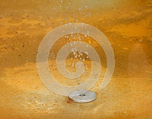 Mineral water bubbles into the tank in the spa