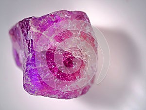 Mineral world series,Amethyst crystal stone on the white and real background photo