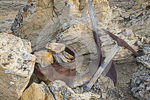 Miners pick shovel bucket rocks work concept