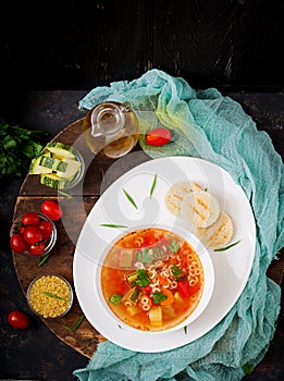 Minestrone - `big soup`, soup with many ingredients - a dish of Italian cuisine