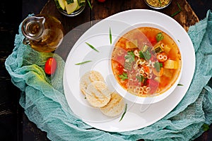 Minestrone - `big soup`, soup with many ingredients - a dish of Italian cuisine