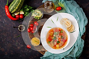 Minestrone - `big soup`, soup with many ingredients - a dish of Italian cuisine