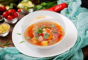 Minestrone - `big soup`, soup with many ingredients - a dish of Italian cuisine