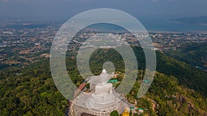 Ming Mongkol Buddha statue on the hill in Phuket town. Aerial view. Thailand