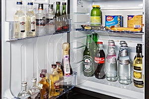 mini bar with soft drinks, vodka, wine and beer in the hotel ro