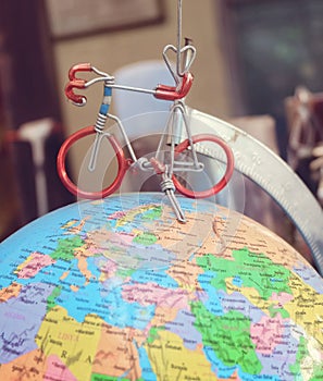 Mini Bicycle on Model of The Globe of Earth