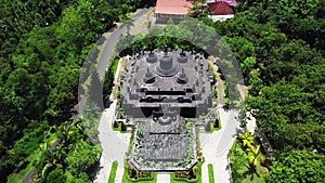 Mini Borobudur - miniature in Brahma Vihara Arama Buddhist Monastery, slide