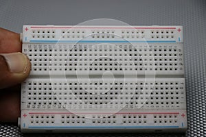 Mini breadboard which is used for prototyping various electronic projects. Circuit experiment solderless breadboard