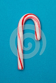 Mini Candy Cane on a Blue Background