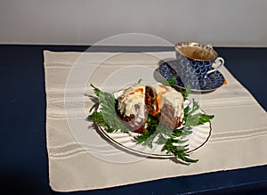 Mini carrot cake with cream cheese icing and a cup of tea