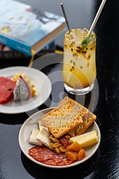 mini cheese board serve with alcoholic beverage