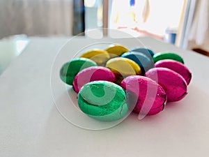 Mini Chocolate easter eggs for children on white background