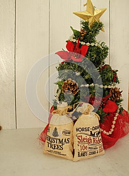 Mini Christmas tre, , burlap bag advertisements sleigh rides 10 cents