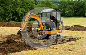 Mini Digger In Action