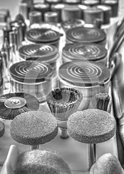 Mini drill machine with set of different accessories in black and white