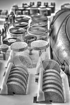 Mini drill machine with set of different accessories in black and white