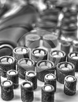 Mini drill machine with set of different accessories in black and white