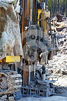 Mini-drilling rig on crawler track photo