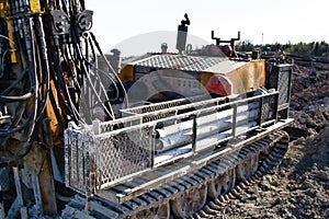 Mini-drilling rig on crawler track photo